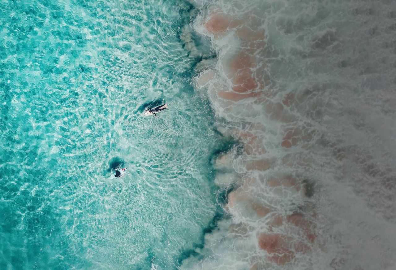 Aerial view of surf breaking along the Noosa coastline